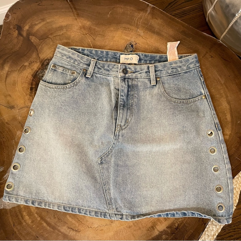 Jean skirt with metal circle cut outs